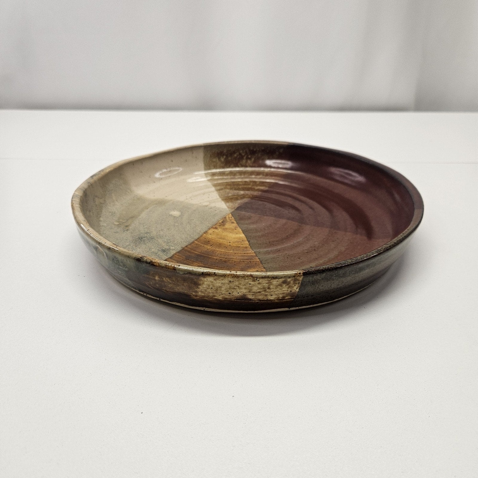 Pottery Plate 10” Brown Red Tan Glazed Dish Stamped Hand Thrown Artist Signed