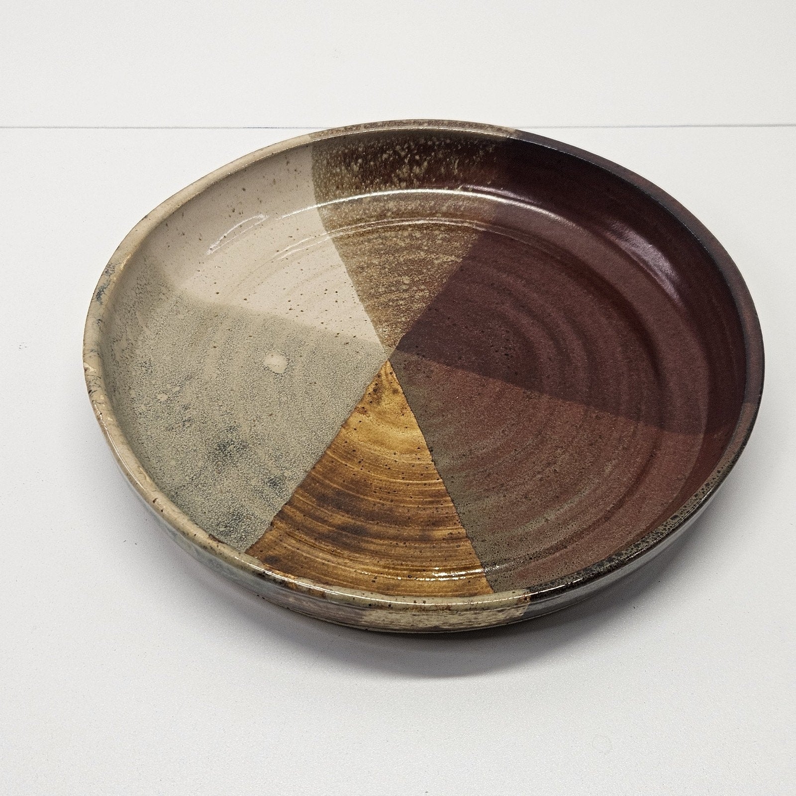 Pottery Plate 10” Brown Red Tan Glazed Dish Stamped Hand Thrown Artist Signed