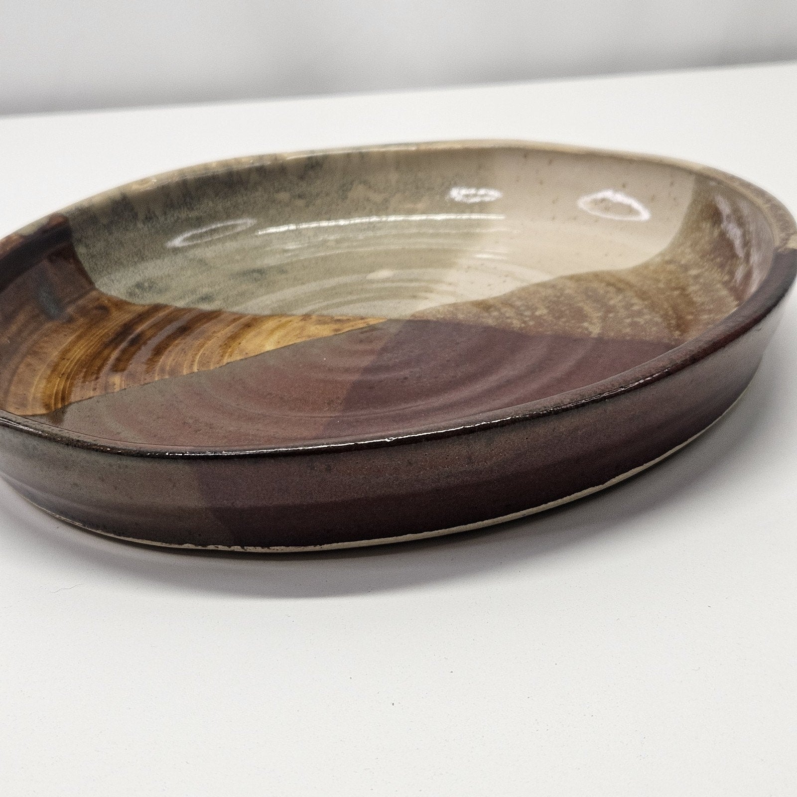 Pottery Plate 10” Brown Red Tan Glazed Dish Stamped Hand Thrown Artist Signed